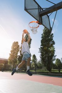 man-playing-basketball-min